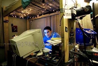 College student in his dorm room loft