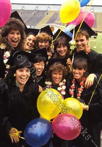 Nine girls clowning at college commencement 