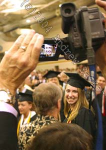 Student shown on video camera at commencement ceremony