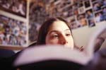 College student reads in her dorm room